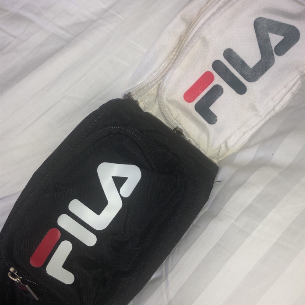 Two Fila fanny packs